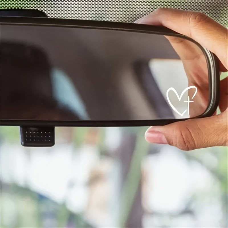 White Christian rearview mirror decal on car mirror